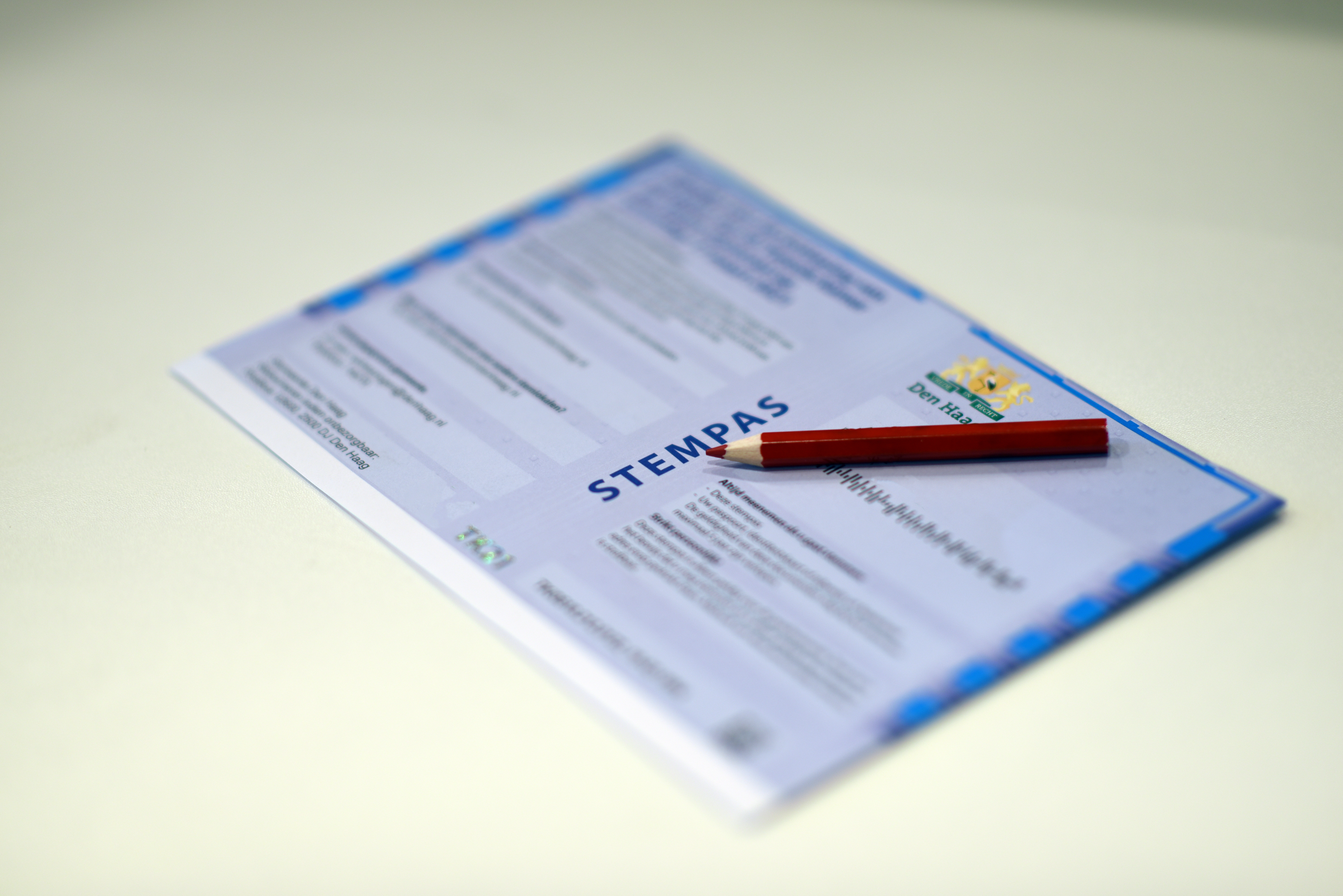 Stempas met rood potlood