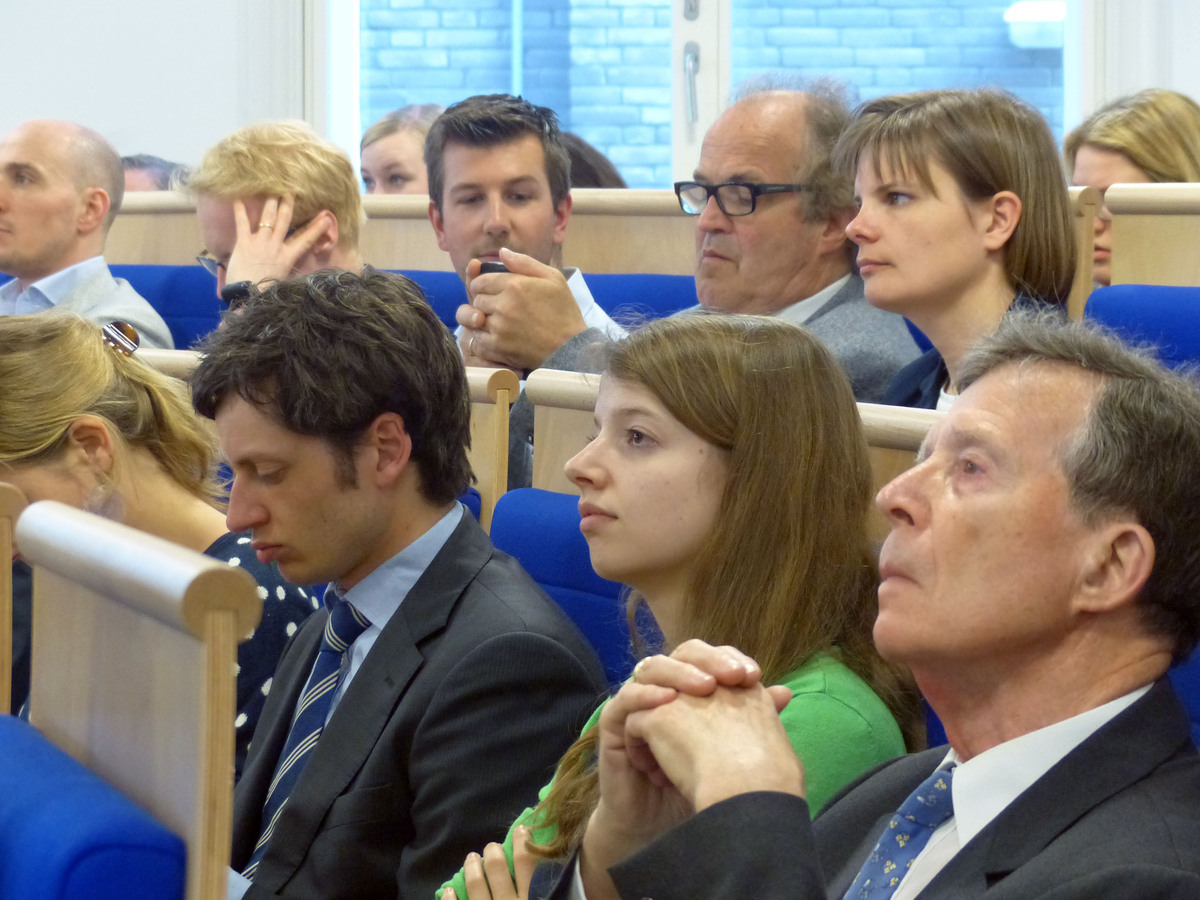 Participants listen attentively