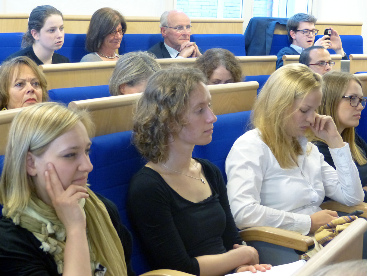 Participants listen attentively
