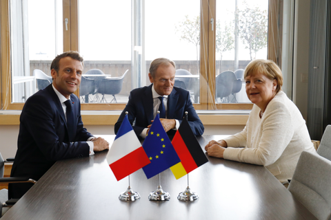 Macron, Tusk en Merkel