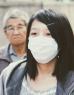Een chinese vrouw met een mondkapje in China
